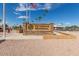 A beautifully crafted 'Veterans Memorial' entrance sign at 506 S 81St Pl, Mesa, AZ 85208
