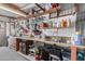 Well-organized workshop with ample storage, shelving, and a double basin sink at 506 S 81St Pl, Mesa, AZ 85208