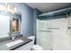 Renovated bathroom showcasing a glass door shower, modern vanity, and stylish fixtures at 540 Leisure World --, Mesa, AZ 85206