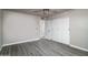 Bedroom featuring hardwood floors and a closet with sliding doors at 540 Leisure World --, Mesa, AZ 85206