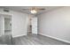 Clean bedroom boasts updated flooring, closet, and neutral walls at 540 Leisure World --, Mesa, AZ 85206