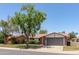 Charming single-story home featuring lush landscaping and a well-maintained front yard with brick accents at 540 Leisure World --, Mesa, AZ 85206