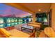 Backyard featuring an inviting seating area with view of the pool and covered patio at 6325 E Helm Dr, Scottsdale, AZ 85254