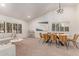 Elegant dining area with modern furniture, ample lighting, and a comfortable atmosphere at 6325 E Helm Dr, Scottsdale, AZ 85254