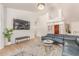 Bright living room with vaulted ceilings, contemporary furnishings, and stylish decor at 6325 E Helm Dr, Scottsdale, AZ 85254