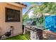 Modern outdoor grill area with a built-in grill and ample counter space, perfect for outdoor cooking and entertaining at 6325 E Helm Dr, Scottsdale, AZ 85254