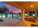 Back patio featuring an inviting seating area with view of the pool and desert landscaping at 6325 E Helm Dr, Scottsdale, AZ 85254