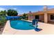 Refreshing backyard pool and outdoor lounging area, perfect for relaxation and entertaining under the sun at 6325 E Helm Dr, Scottsdale, AZ 85254