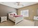 Spacious main bedroom with accent wall, ceiling fan, and bright natural light at 6425 S Kimberlee Way, Chandler, AZ 85249
