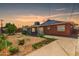 Spacious backyard with a covered patio and brick accents, perfect for outdoor enjoyment at 6541 N 41St Ave, Phoenix, AZ 85019