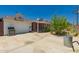 Backyard with detached garage, basketball hoop, covered patio, and large open area at 6541 N 41St Ave, Phoenix, AZ 85019