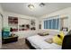 Bright bedroom with built-in shelves and a plush carpet at 6541 N 41St Ave, Phoenix, AZ 85019