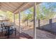 The covered back porch offers shade and a place to relax and enjoy the privacy fenced backyard at 711 E Mckinley St, Phoenix, AZ 85006