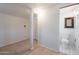 Finished basement space with tile flooring and an access to the bathroom at 711 E Mckinley St, Phoenix, AZ 85006