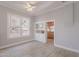 Well-lit dining room with hardwood floors, a ceiling fan, and an open view into the adjacent kitchen at 711 E Mckinley St, Phoenix, AZ 85006
