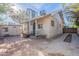The back of this home offers a great shaded porch and a paved area for outdoor entertaining at 711 E Mckinley St, Phoenix, AZ 85006