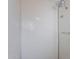 Shower stall with white tile and chrome fixtures at 711 E Mckinley St, Phoenix, AZ 85006