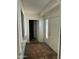 Entryway with tile floor, window, and doorway leading to the next room, and a white front door at 8155 W Desert Cove Ave, Peoria, AZ 85345