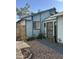 Charming single story home exterior with a secure front door and low-maintenance desert landscaping at 8155 W Desert Cove Ave, Peoria, AZ 85345