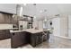 Open kitchen with stainless steel appliances and granite countertops at 8361 E San Rafael Dr, Scottsdale, AZ 85258