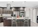 Open kitchen with stainless steel appliances and granite countertops at 8361 E San Rafael Dr, Scottsdale, AZ 85258