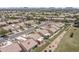 Planned community featuring lush landscaping, well-maintained homes, and scenic streets at 8431 W Utopia Rd, Peoria, AZ 85382
