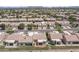 Residential community with manicured landscaping, and tile roofs at 8431 W Utopia Rd, Peoria, AZ 85382