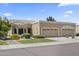 Charming single-story home with a tile roof, three-car garage, and desert landscaping at 8431 W Utopia Rd, Peoria, AZ 85382