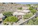 Aerial view of a desert community highlighting unique architecture and lush desert landscaping at 10222 E Southwind Ln # 1018, Scottsdale, AZ 85262