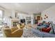Open-concept living area with comfortable seating, a fireplace, and seamless flow at 10222 E Southwind Ln # 1018, Scottsdale, AZ 85262