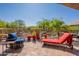 Relaxing outdoor patio with stylish furniture and desert views at 10222 E Southwind Ln # 1018, Scottsdale, AZ 85262