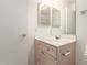 Bathroom featuring a single sink vanity with neutral-colored cabinetry at 10845 W Manzanita Dr, Peoria, AZ 85345