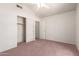 Bedroom showcasing carpet and a door to a closet at 10845 W Manzanita Dr, Peoria, AZ 85345