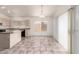 Kitchen featuring tile flooring and lots of natural light at 10845 W Manzanita Dr, Peoria, AZ 85345