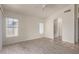 Spacious living room boasts a ceiling fan and lots of natural light at 10845 W Manzanita Dr, Peoria, AZ 85345