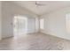 Bright living room features a ceiling fan and access to the backyard at 10845 W Manzanita Dr, Peoria, AZ 85345