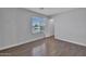 Bedroom with hardwood-style flooring and a window at 1090 S Bogle Ct, Chandler, AZ 85286