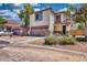 Street view of a well-maintained two-story home featuring desert landscaping and attached two-car garage at 1090 S Bogle Ct, Chandler, AZ 85286