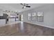 Bright living room featuring light wood floors, stainless steel appliances and abundant natural light at 1090 S Bogle Ct, Chandler, AZ 85286