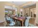 Bright dining space with direct view to the kitchen and living area at 10914 E Tarragon Ave, Mesa, AZ 85212