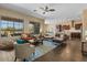 Bright open floor plan with large windows and modern decor at 10914 E Tarragon Ave, Mesa, AZ 85212