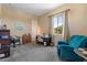 Office with a desk, large chair, and a bright window at 10914 E Tarragon Ave, Mesa, AZ 85212