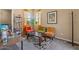 Sitting room with natural light and three decorative chairs at 10914 E Tarragon Ave, Mesa, AZ 85212