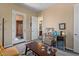 Sitting room with bar, desk, and views of the entry at 10914 E Tarragon Ave, Mesa, AZ 85212