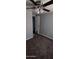 Cozy bedroom with new carpeting, a ceiling fan, and paneled walls at 11000 N 91St Ave # 84, Peoria, AZ 85345