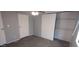 Bedroom with a double door closet and neutral paint at 11000 N 91St Ave # 84, Peoria, AZ 85345