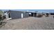 The mobile home showcases an extensive gravel yard at 11000 N 91St Ave # 84, Peoria, AZ 85345