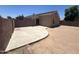 Recently poured, concrete patio in a spacious backyard setting at 13004 W Saint Moritz Ln, El Mirage, AZ 85335