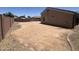 Spacious backyard featuring gravel landscaping and a brick perimeter at 13004 W Saint Moritz Ln, El Mirage, AZ 85335