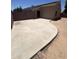 The home features a concrete patio in the backyard with gravel landscaping at 13004 W Saint Moritz Ln, El Mirage, AZ 85335